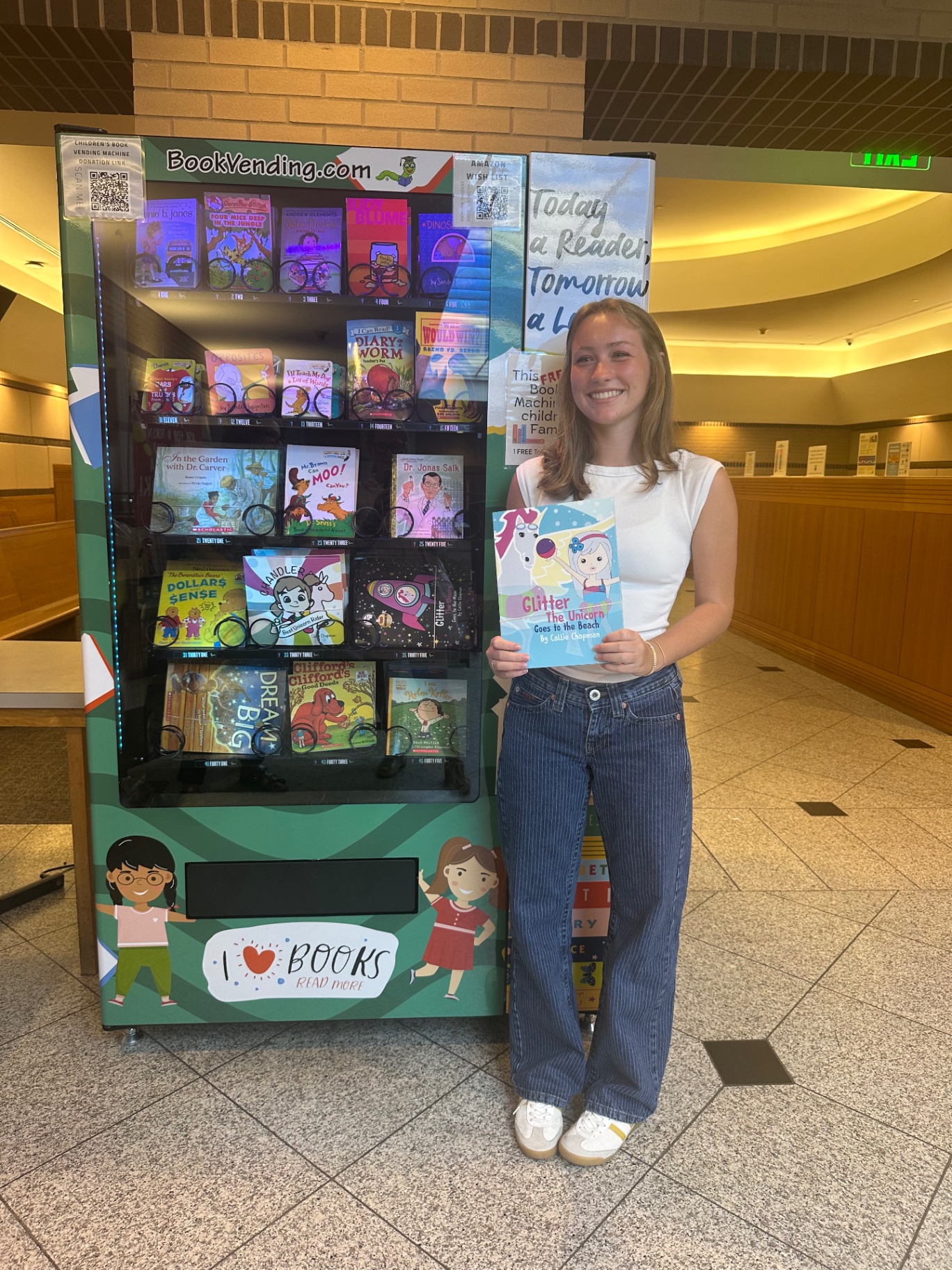 Delivering signed Glitter the Unicorn books to the Family Court children's book vending machine
